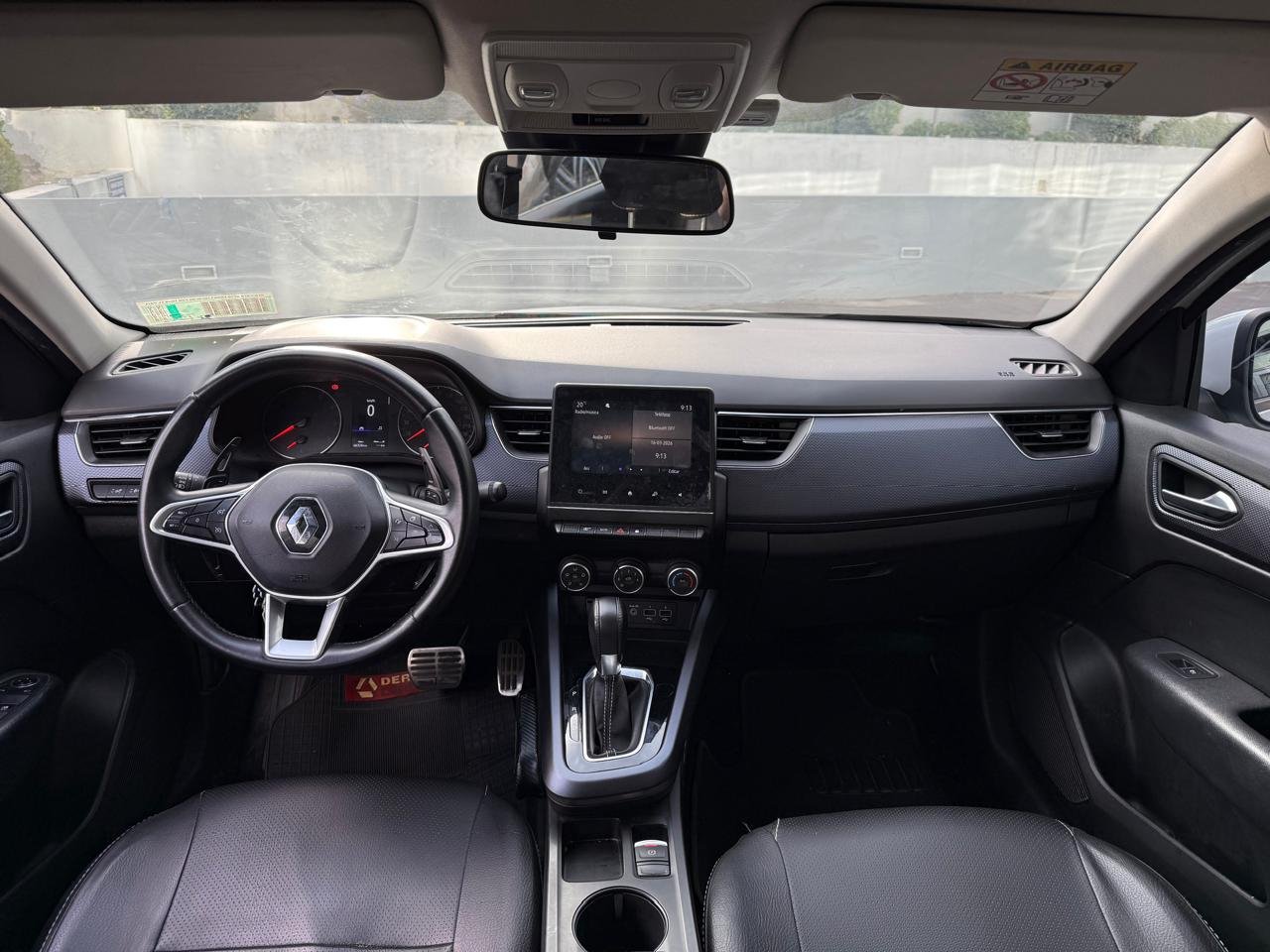 Renault Arkana — foto 18 de 21